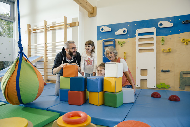 Happy children and teachers in gym room in kindergarten Royalty free image Happy children and teachers in gym room in kindergarten
Royalty free image