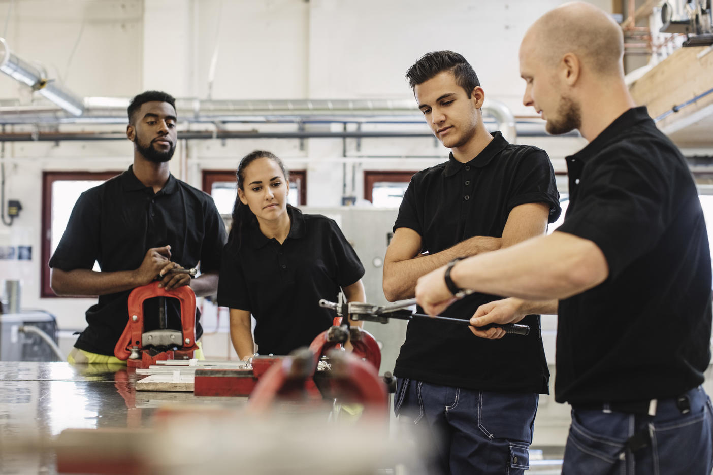 Auto mechanic teacher explaining equipment to students in class Royalty free image Auto mechanic teacher explaining equipment to students in class
Royalty free image