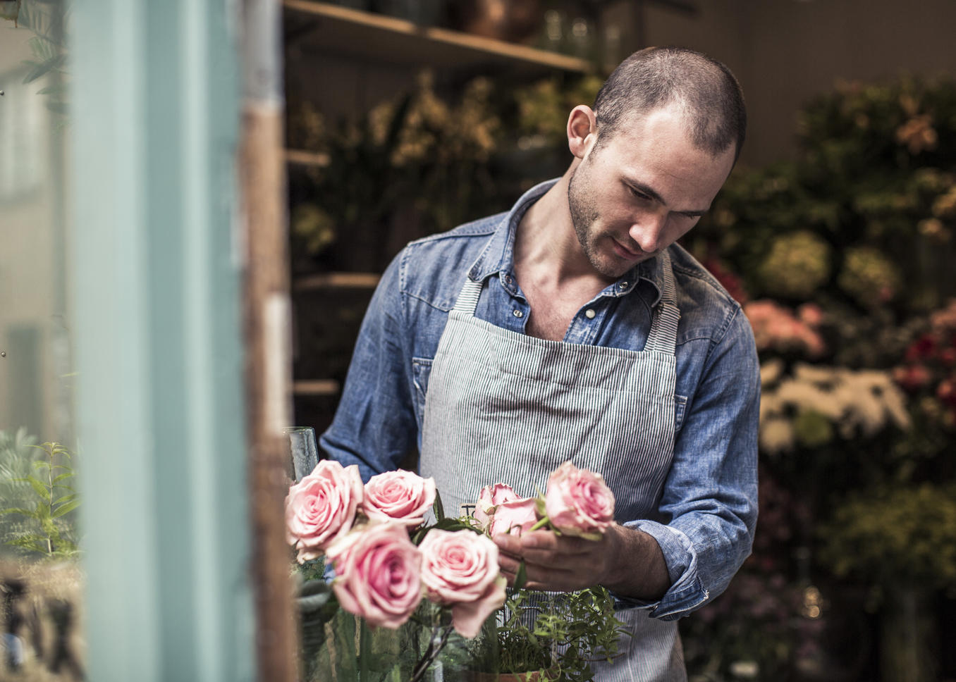 Mid adult male florist analyzing flowers at shop Royalty free image Mid adult male florist analyzing flowers at shop
Royalty free image