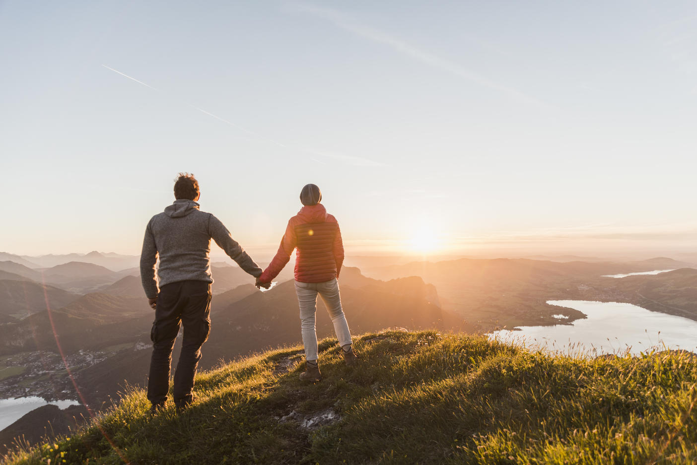 Austria, Salzkammergut, Couple standing on mountain summit, enjoying the view
Royalty free image