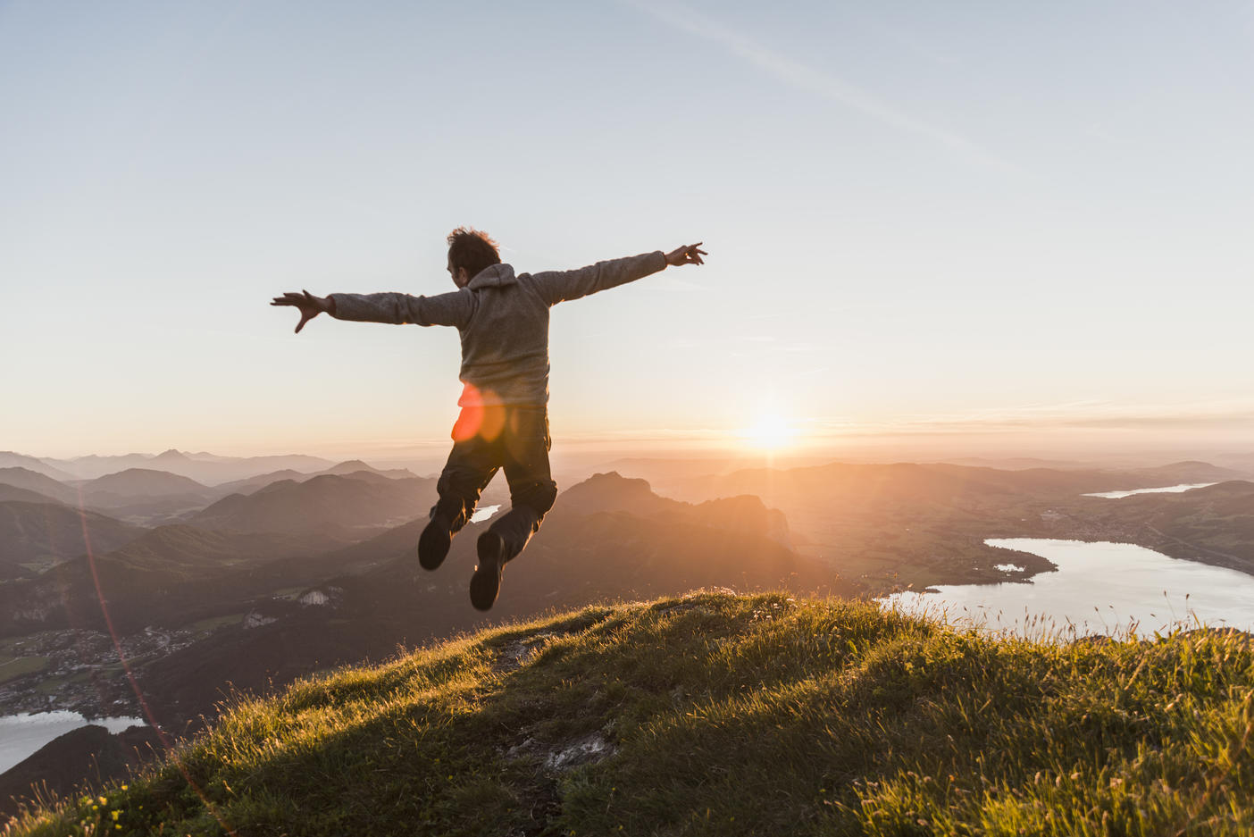 Austria, Salzkammergut, Hiker on mountains summit jumping for joy
Royalty free image