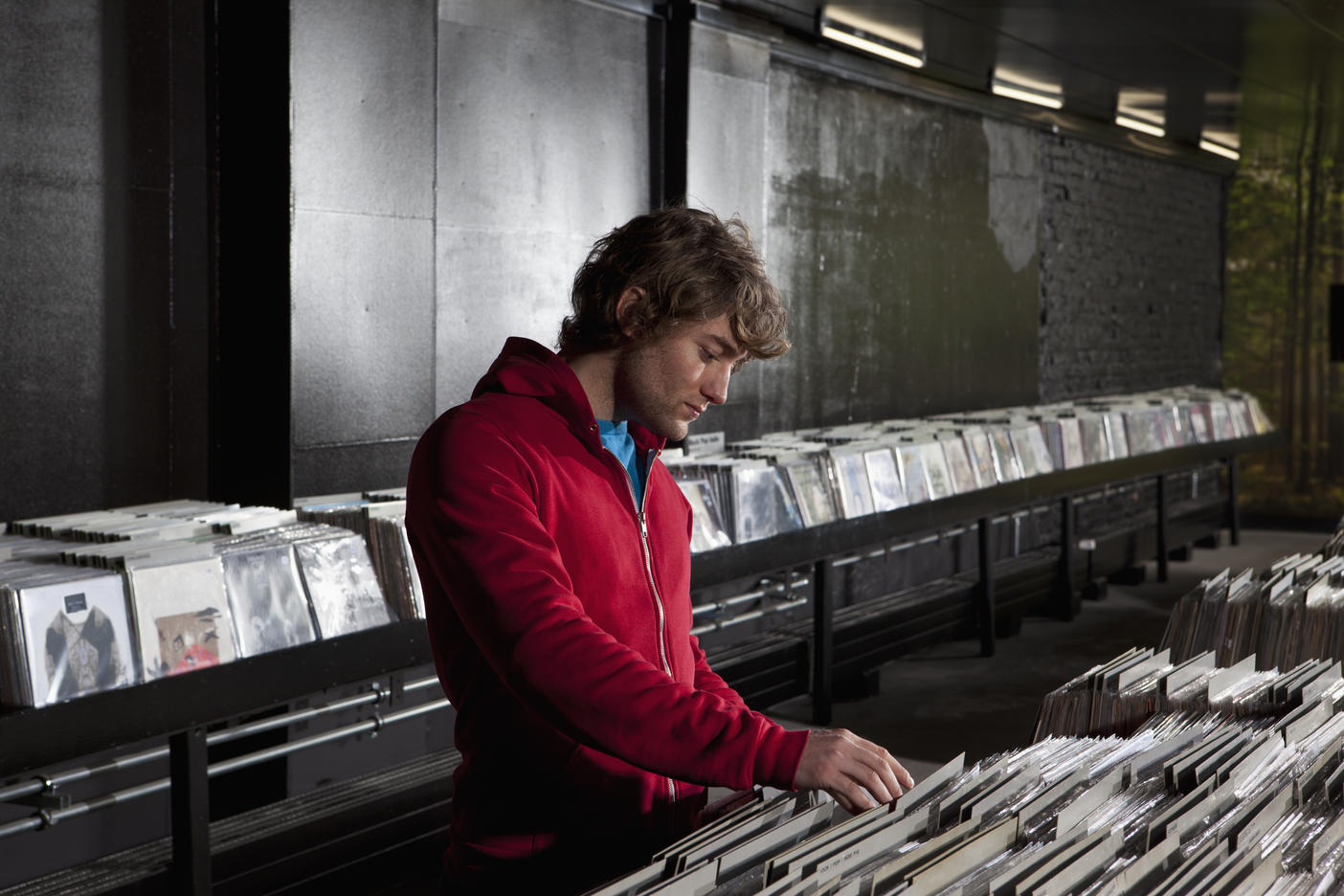 A young man looking through records at a record store
Royalty free image