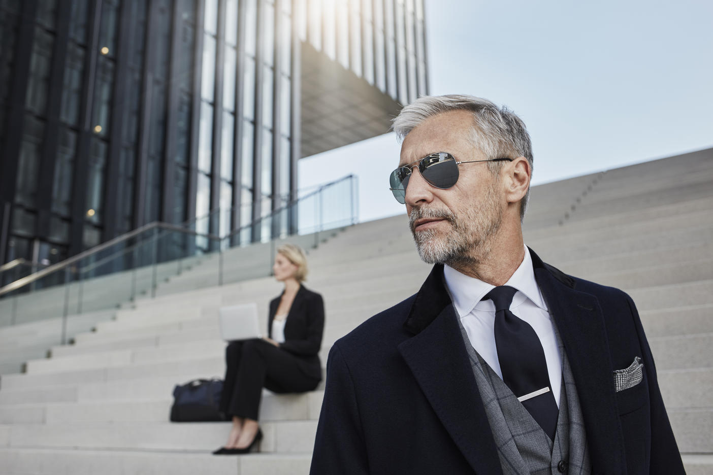 Portrait of fashionable mature businessman wearing sunglassesRoyalty free image