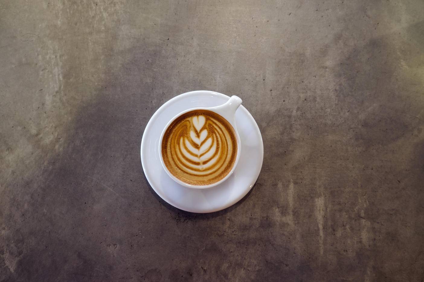 Overhead view of cappuccino on table at coffee shop
Royalty free image