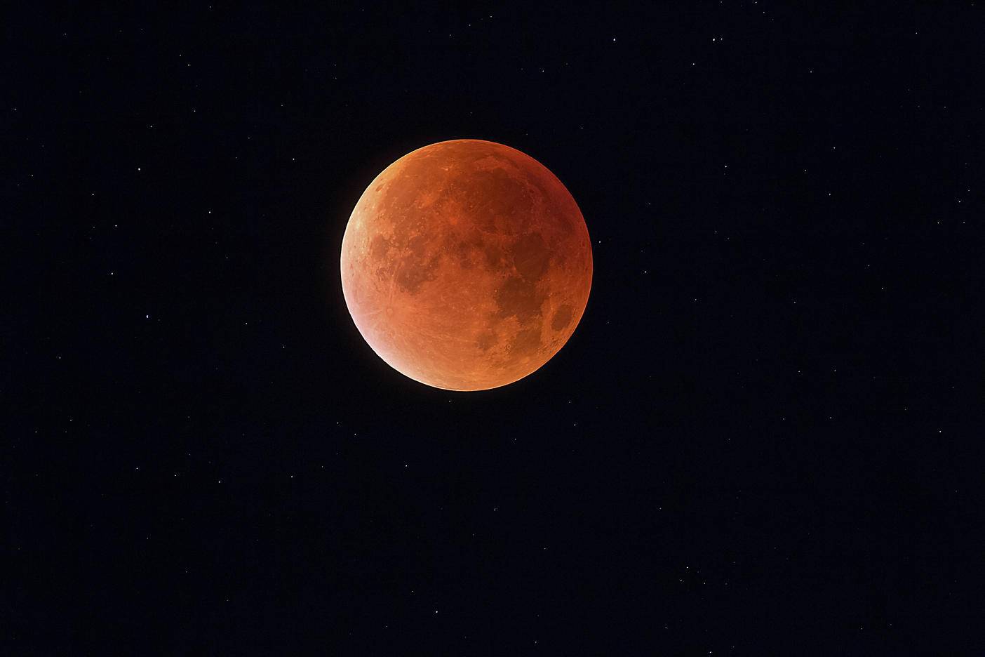 Total lunar eclipse with stars in background, blood moon
Royalty free image