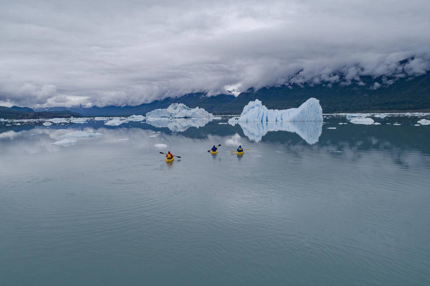 People canoeing in glacier lagoon against cloudy sky, Knik Glacier, Palmer, Alaska, USA
Royalty free image