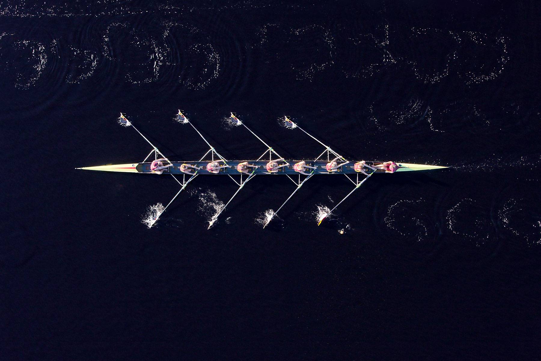 Elevated view of female's rowing eight in water Royalty free image Elevated view of female's rowing eight in water
Royalty free image