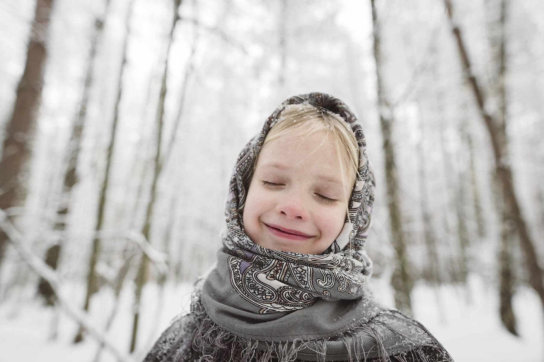 stock image, royalty-free, Portrait of happy little girl wearing headscarf in winter forest
