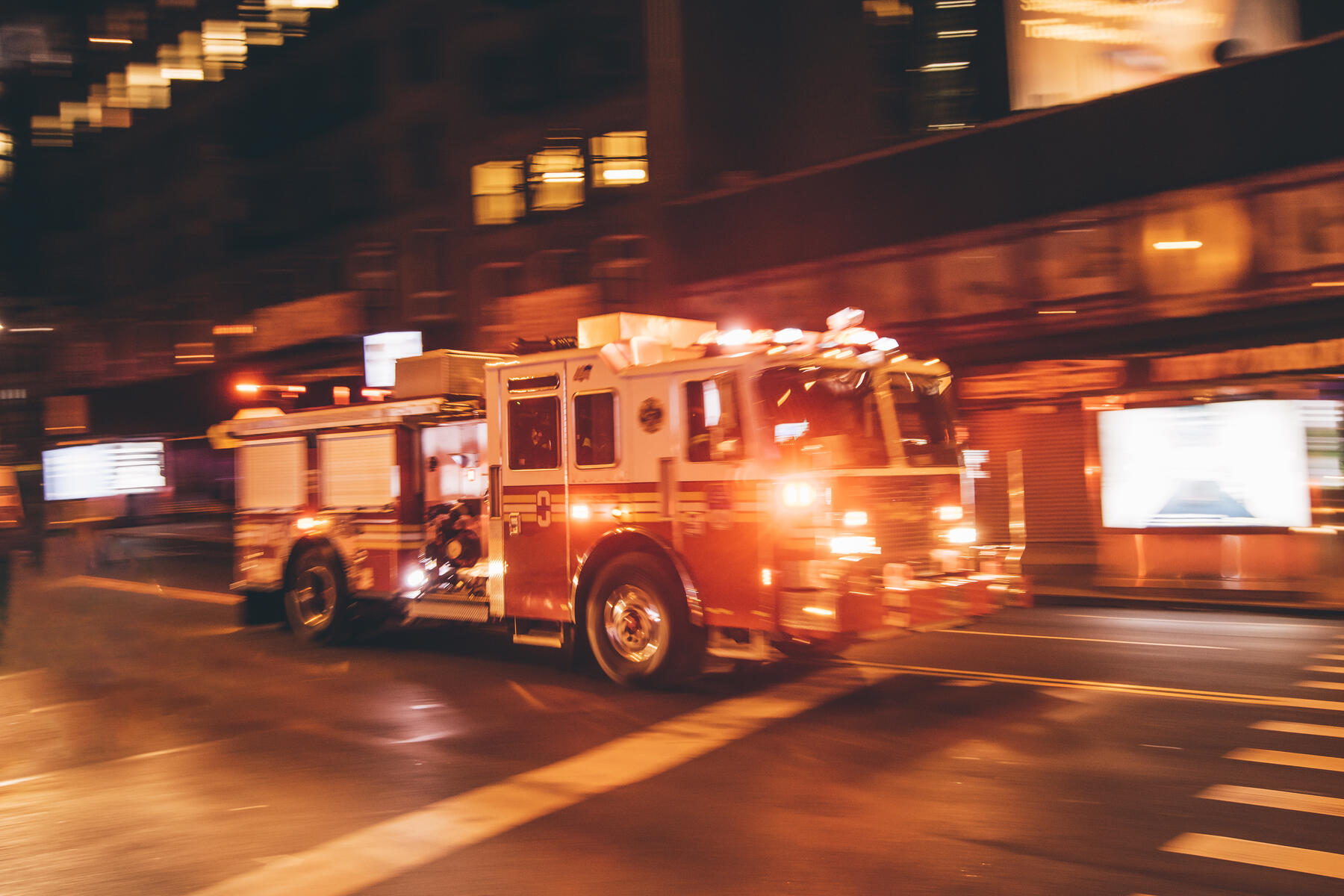 stock image, royalty-free, USA, New York City, fire truck coming along the street