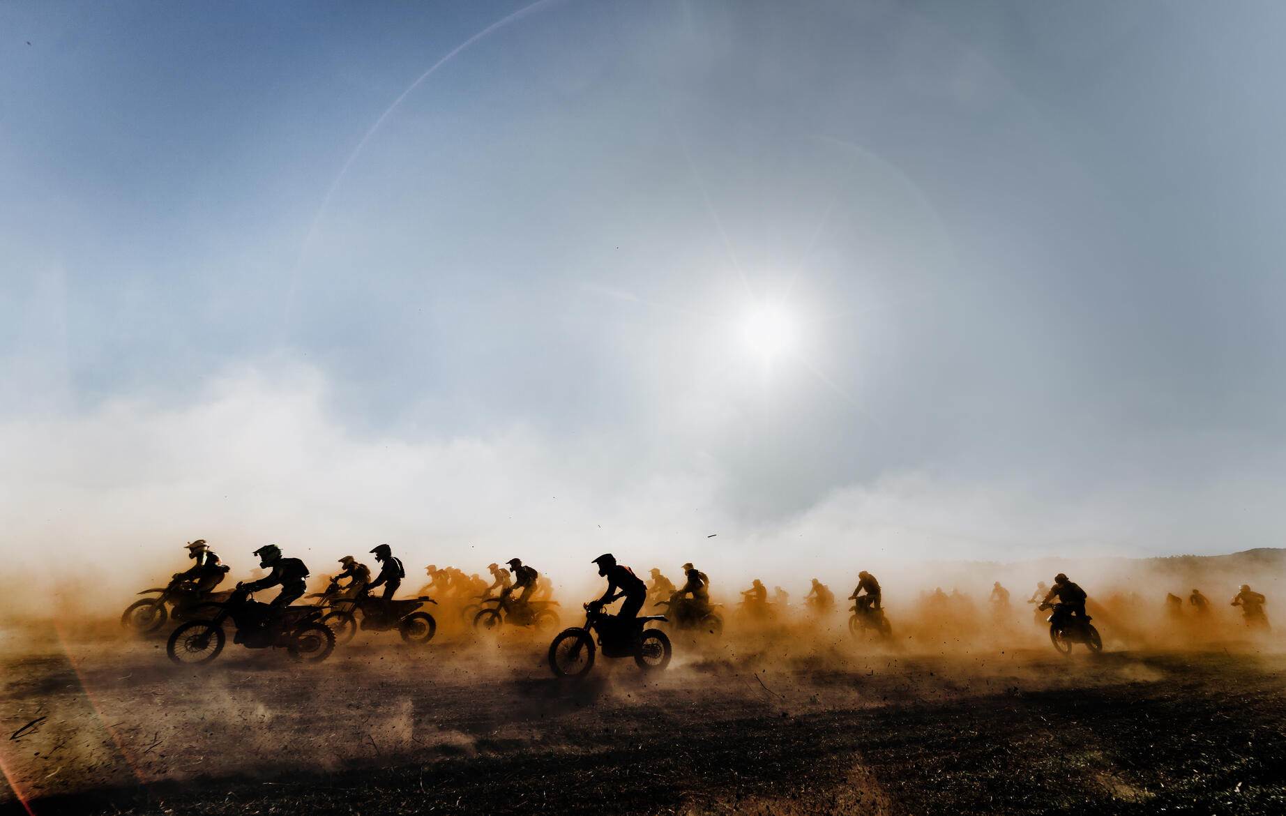 stock image, royalty-free, Group of motocross motorcycles coming out in the race