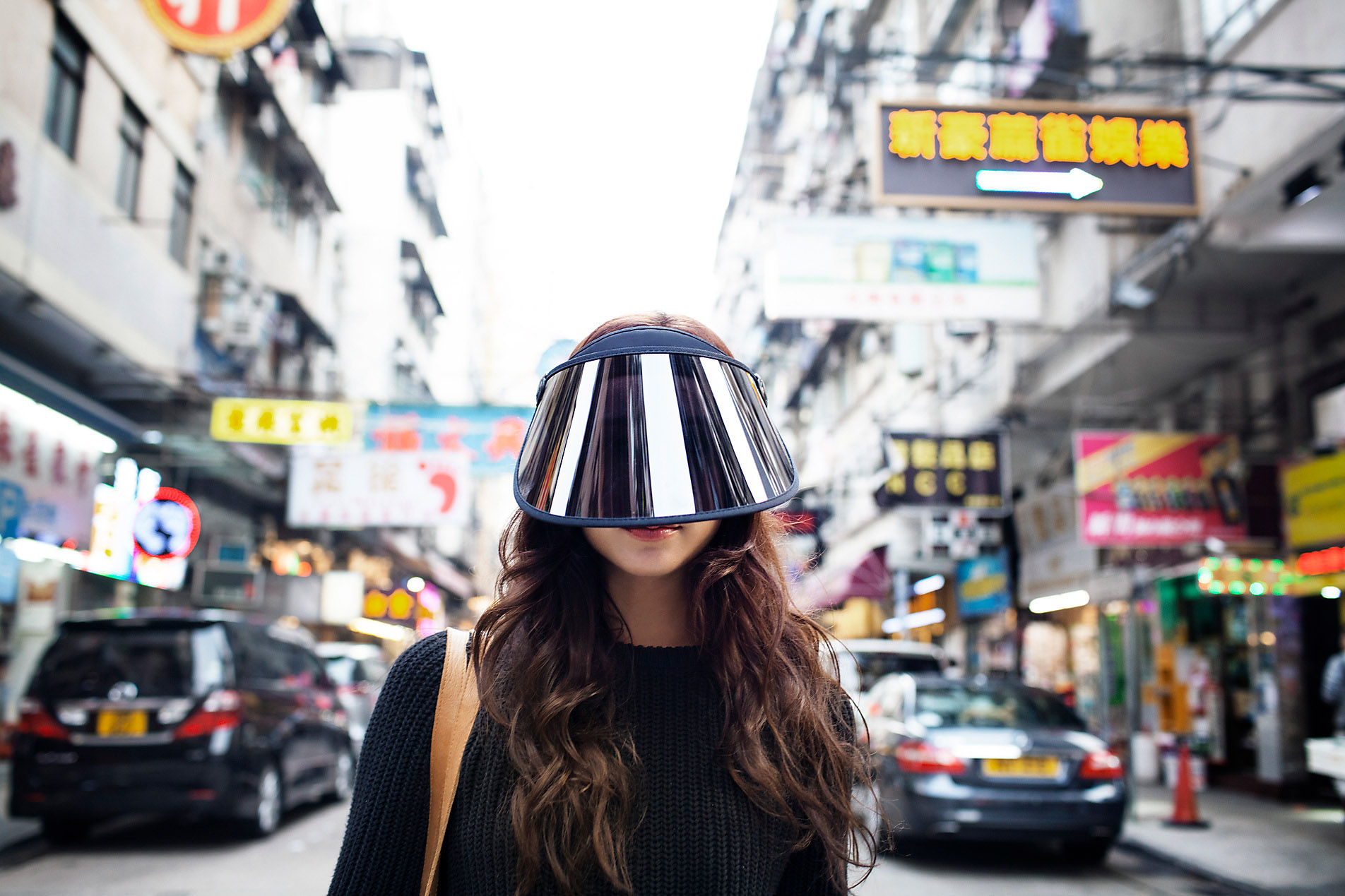 Portrait of a tourist with face visor on a street in Hong Kong, safety, security, stock photo, royalty free