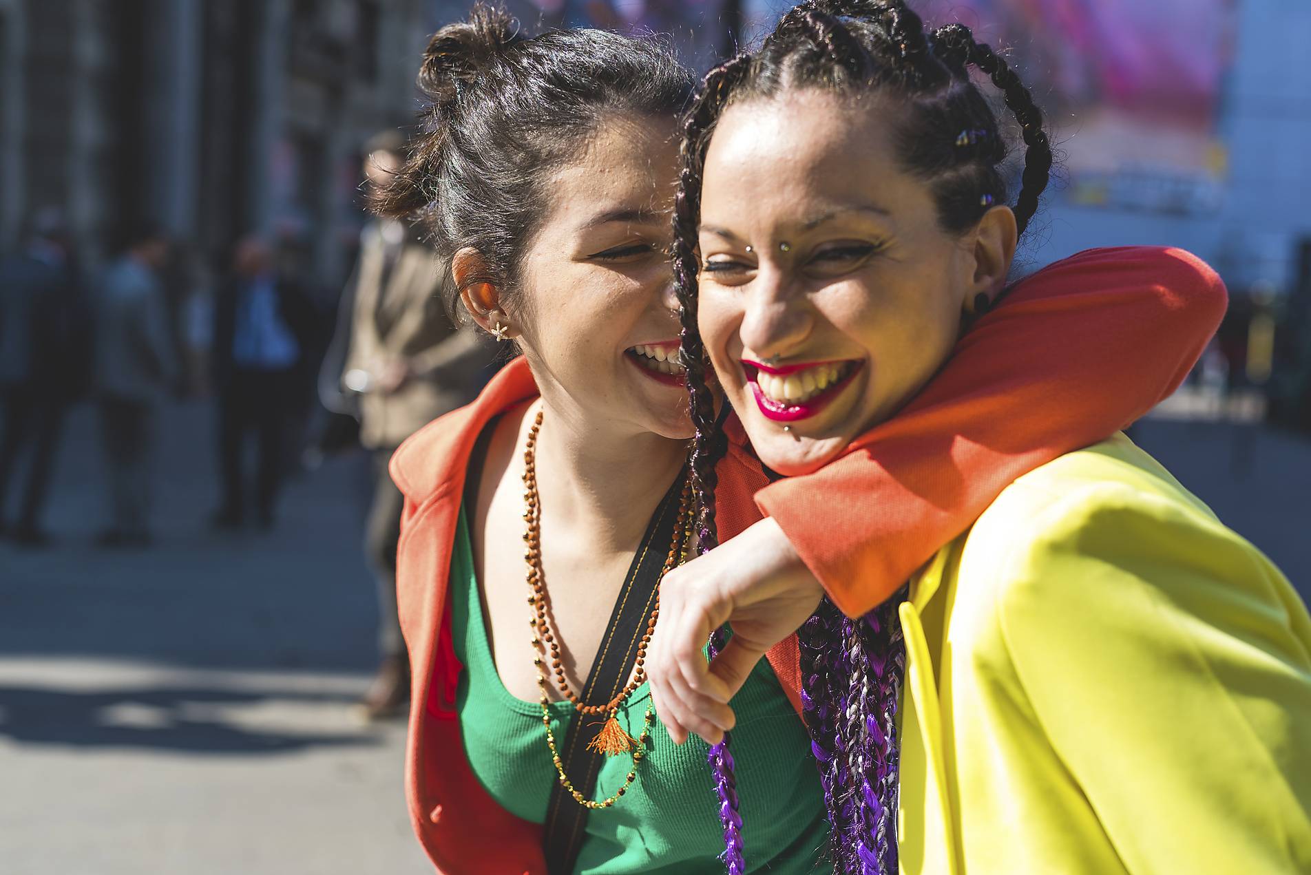 Stock photo, royalty-free, Women in colorful clothing on a street in Milan, Diversity