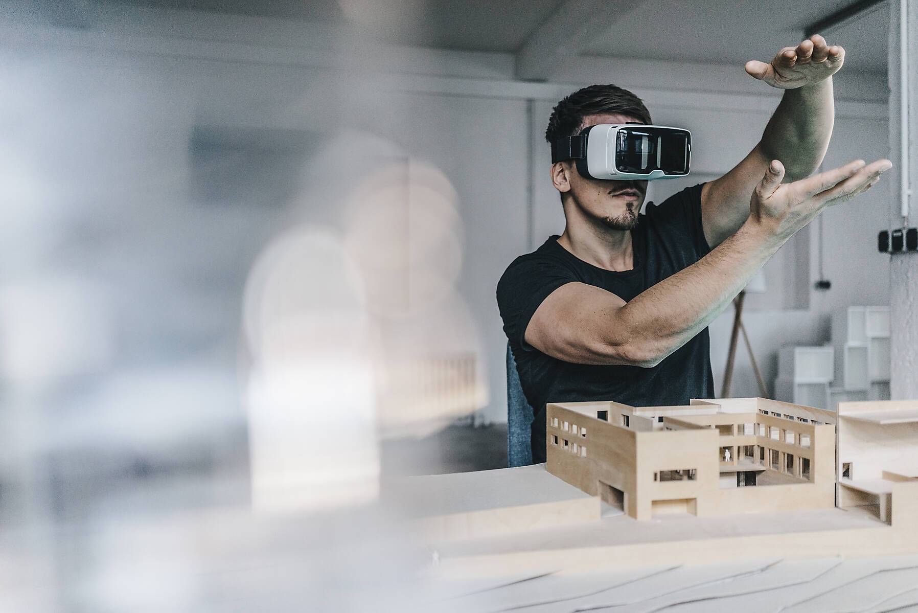 stock images, royalty-free, Man with architectural model and VR glasses