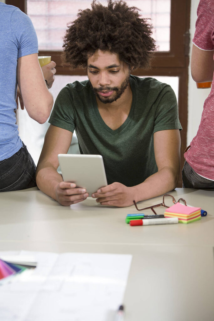stock image, royalty-free, Creative professional using digital tablet at desk in office