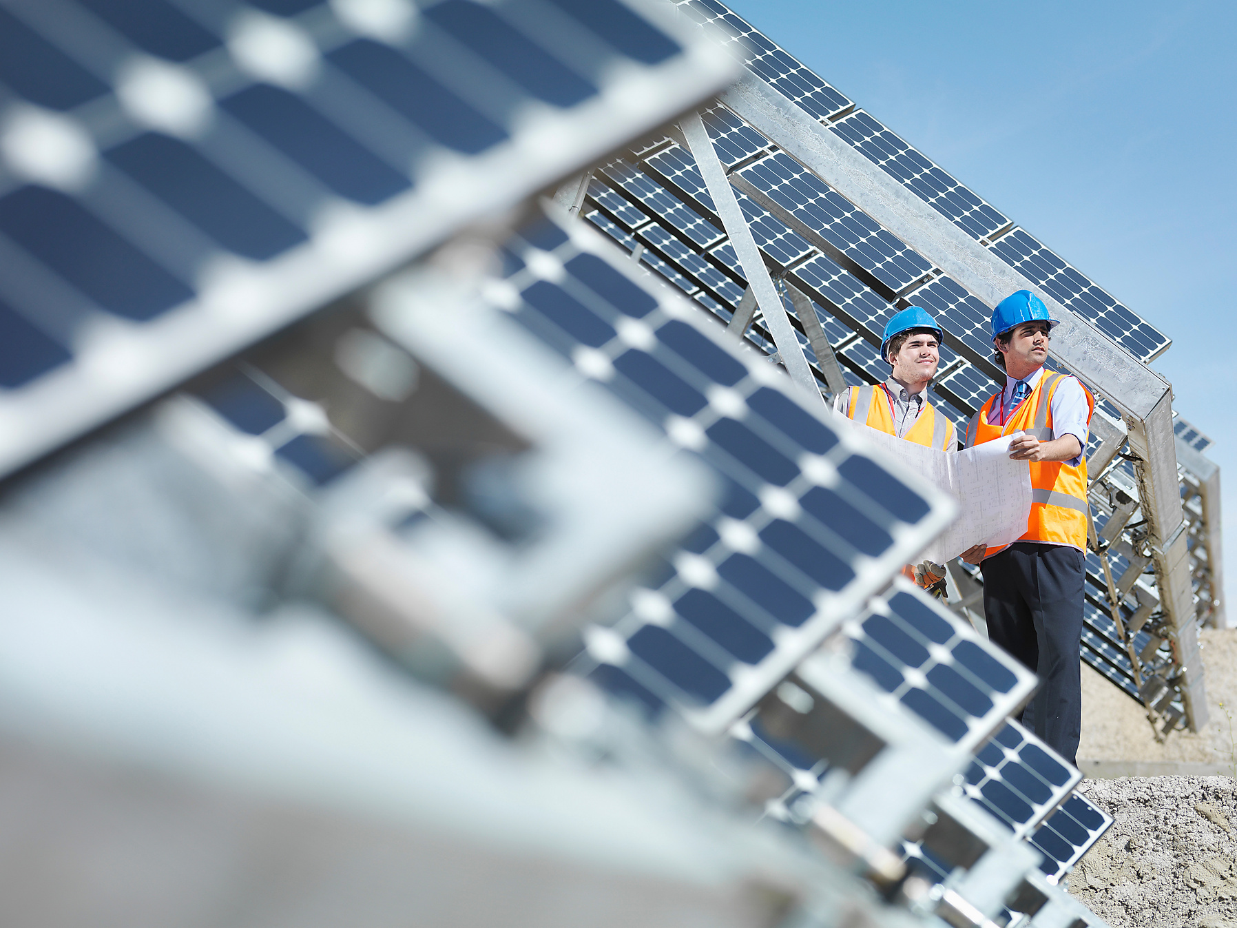 Technicians inspect a solar energy system Solar energy, energy transition, climate change, sustainable, zero emission, climate positive,