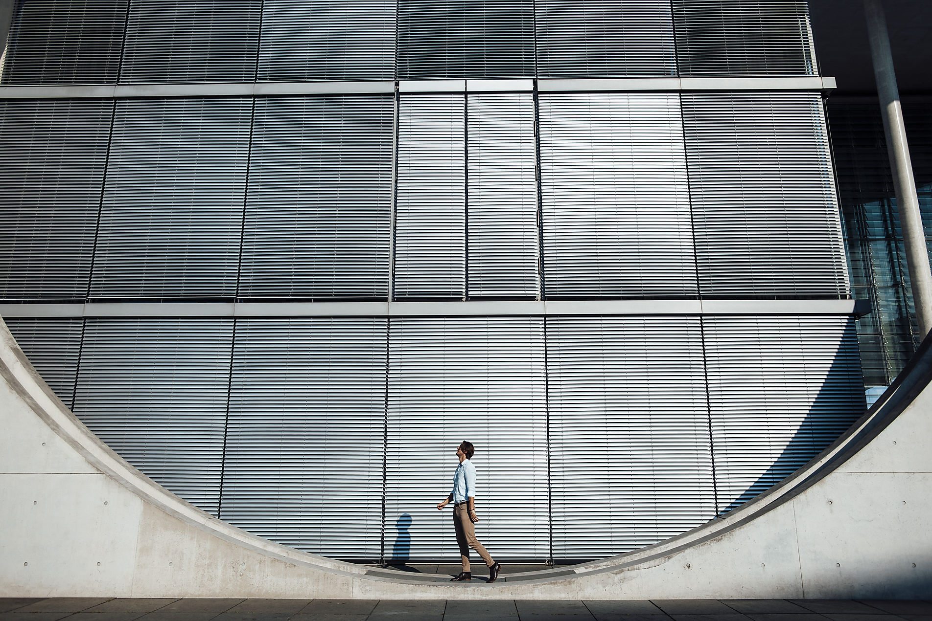 stock image, royalty-free, homepage header, Businessman standing outside modern building