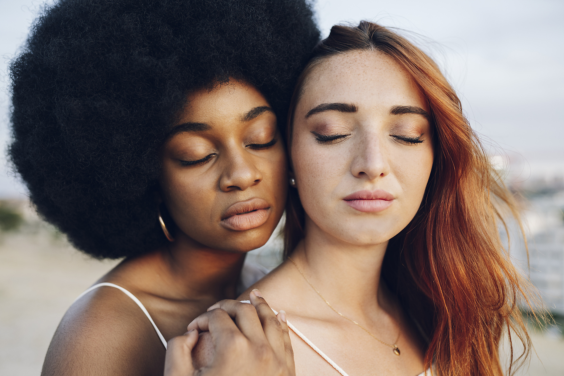 royalty-free, stock photo, Young lesbian couple with eyes closed, diversity,
