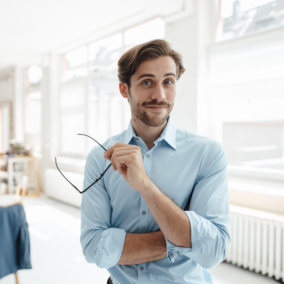 stock image, royalty-free, Male business professional with eyeglasses in office, homepage header