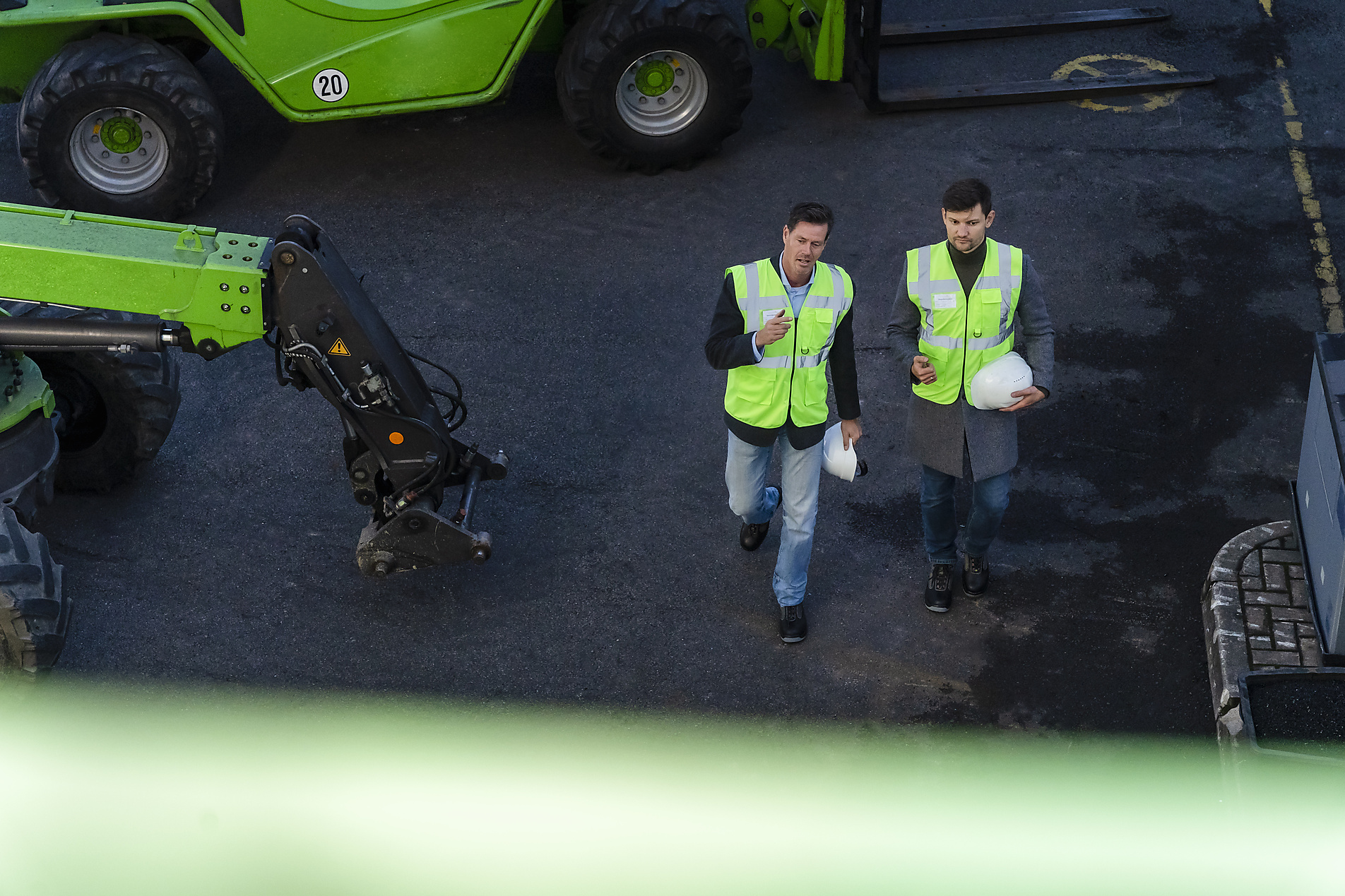 stock image, royalty-free, Engineers holding hardhats discussing and walking at recycling plant, Westend61, Pyrum Innovations, Recycling, Sustainability, eco-friendly, Industry, Daniel Ingold,