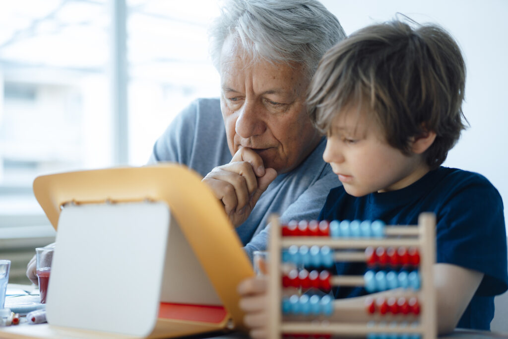 stock image, royalty-free, Senior man using tablet PC by grandson at home, Joseffson, Westend61, future, education