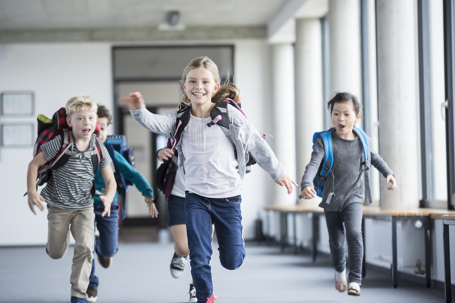 stock image, royalty-free, westend61, Excited pupils rushing down school corridor, future, education