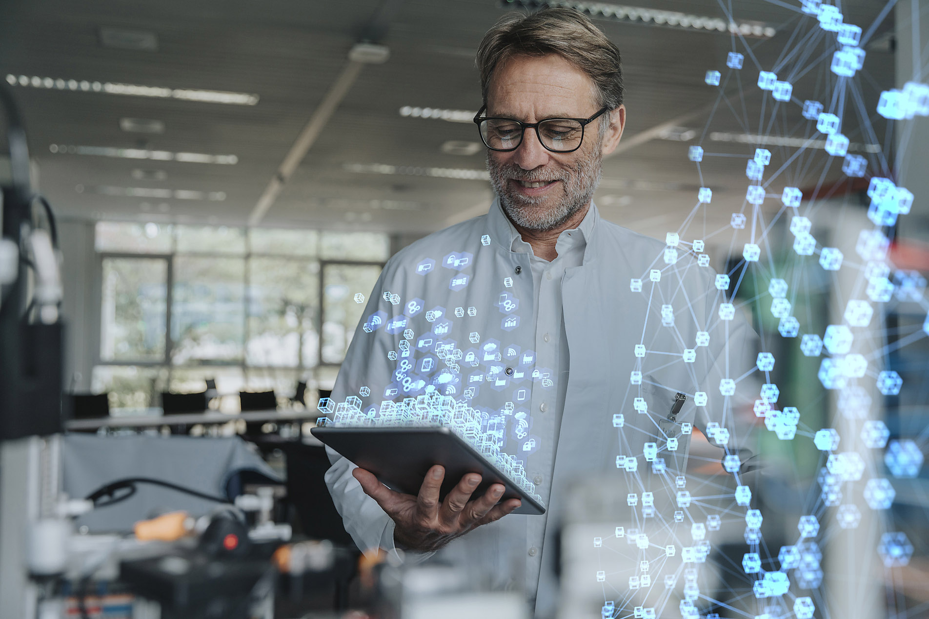 Smiling male engineer with digital tablet working on networking project, innovation, business, stock photo trends 2023, visual trends, royalty free