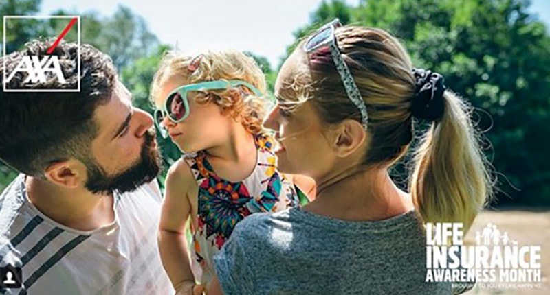 Little girl with sunglasses giving kisses to her parents
Royalty free image