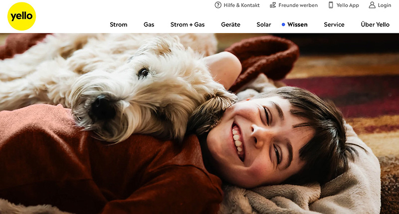 Boy and his dog cuddling on the floor together on a blanket.
Royalty free image