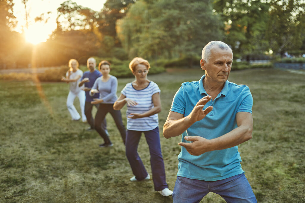 Group of people doing Tai chi in a park
Royalty free image