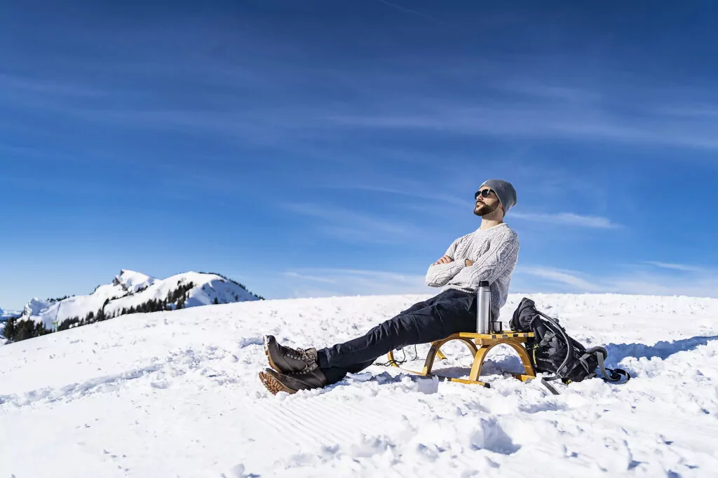 Germany, Bavaria, Brauneck, man in winter in the mountains having a break
Royalty free image