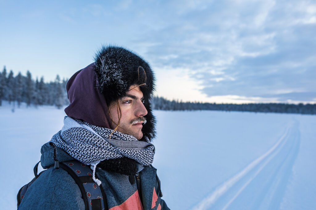 Porträt eines Mannes in Winterlandschaft mit gefrorenem Schnurrbart, Ounasjaervi, Enontekioe, Finnland
Lizenzfreies Stockfoto