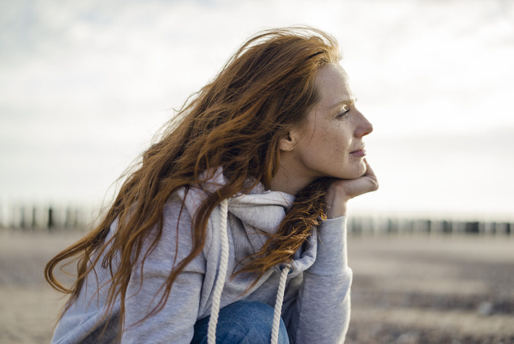Redheaded woman enjoying fresh air at the beach
Royalty free image