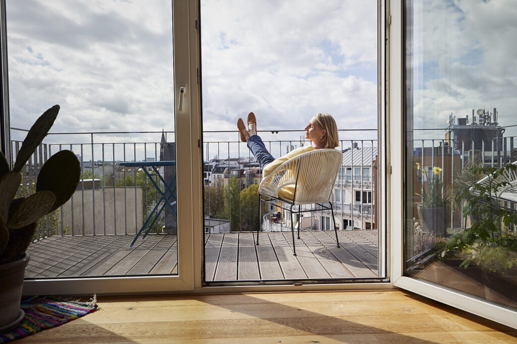 Mature woman at home relaxing on balcony
Royalty free image