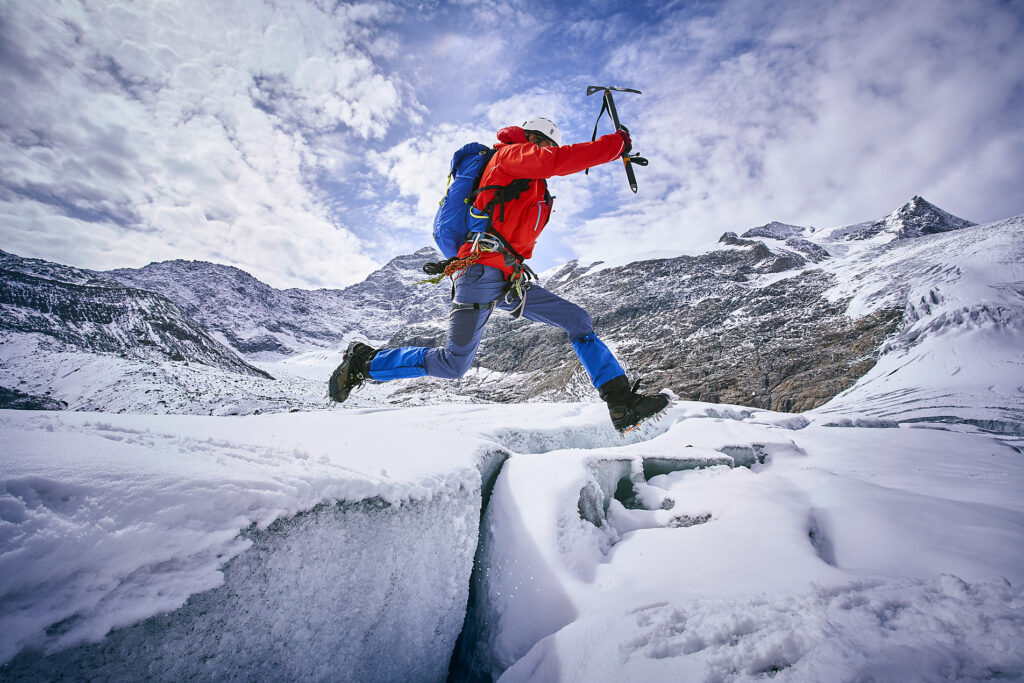 Mountaineer jumping over crevasse, Glacier Grossvendediger, Tyrol, Austria
Royalty free image
