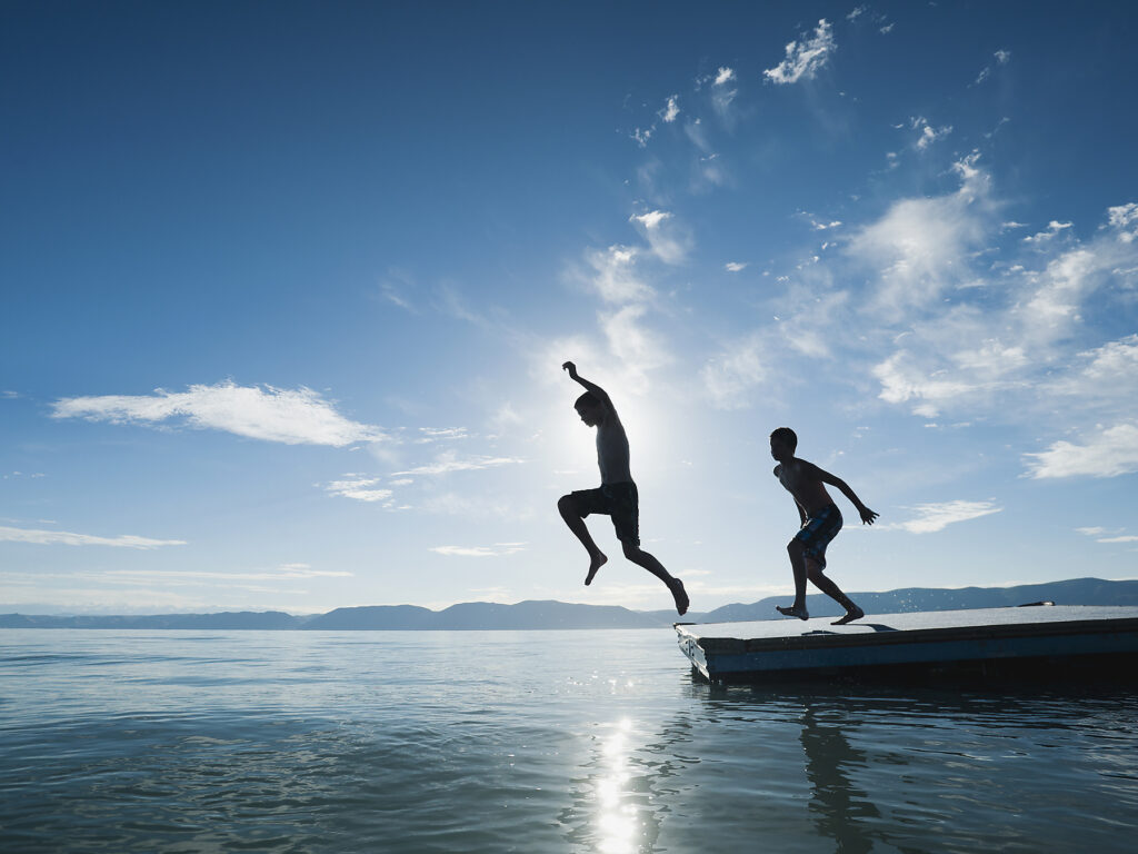 Boys (10-11,12-13) jumping from raft
Royalty free image