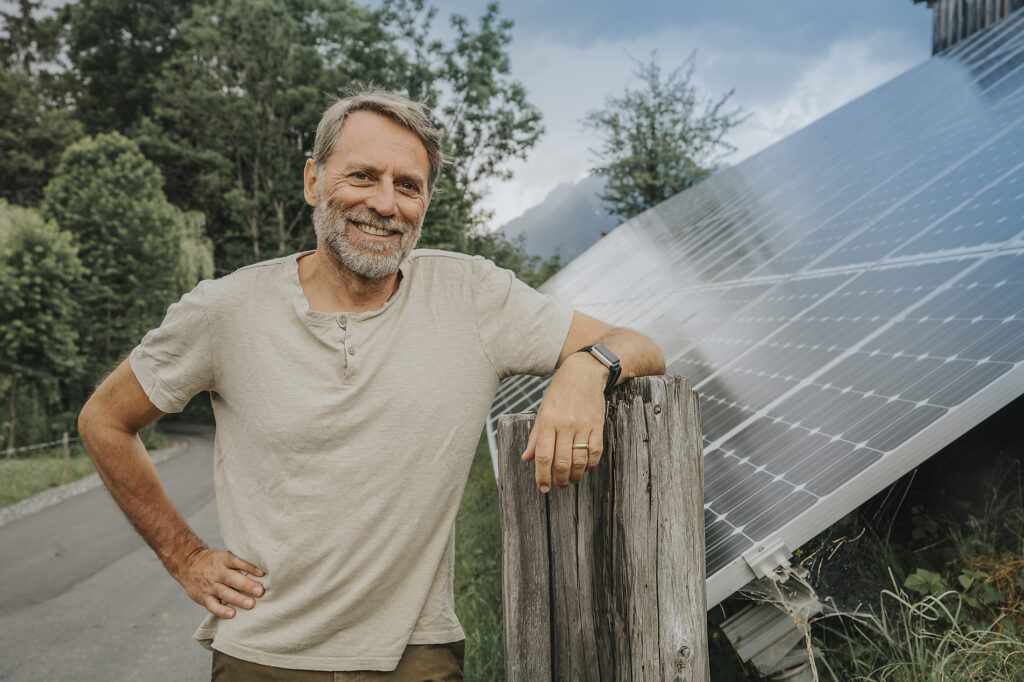 Smiling mature man standing on road by solar panel Royalty-free image Smiling mature man standing on road by solar panel
Royalty-free image