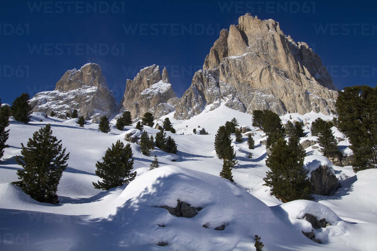 Italy, Dolomites, Langkofel, View of rock and snow in winter stock photo