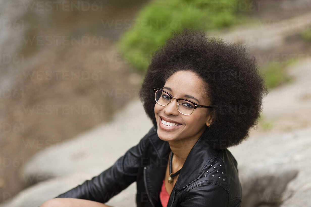 Young woman wearing leather jacket stock photo