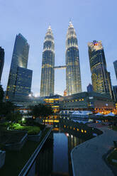 Petronas Towers at dusk, Kuala Lumpur, Malaysia - GIOF07419