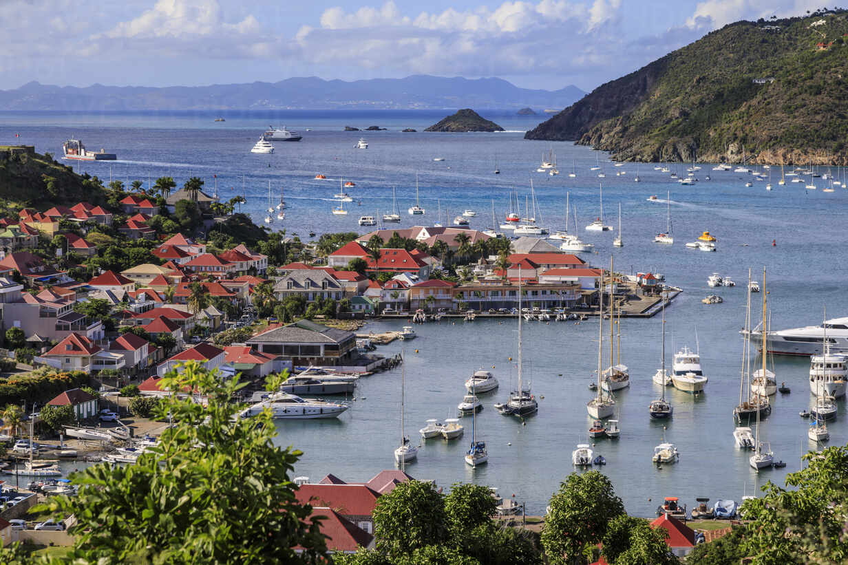 Elevated view over pretty red rooftops of town and sea, Gustavia