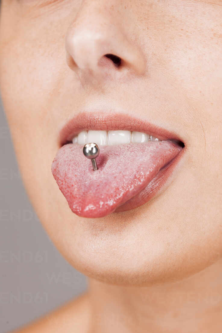 Sticking out woman tongue 